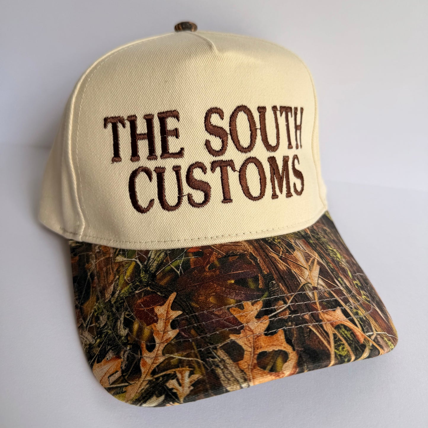 The South Customs Camo Trucker Hat